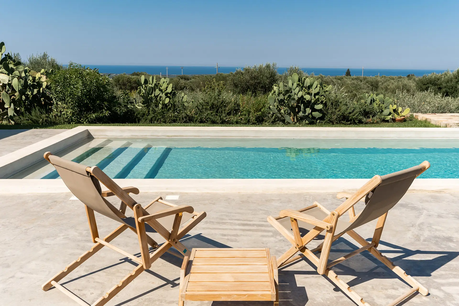 79_NUOVA_Villa_Margareta_Puglia_Paradise_luxury_seafront_swimming_pool_veranda_overview_ulive_trees
