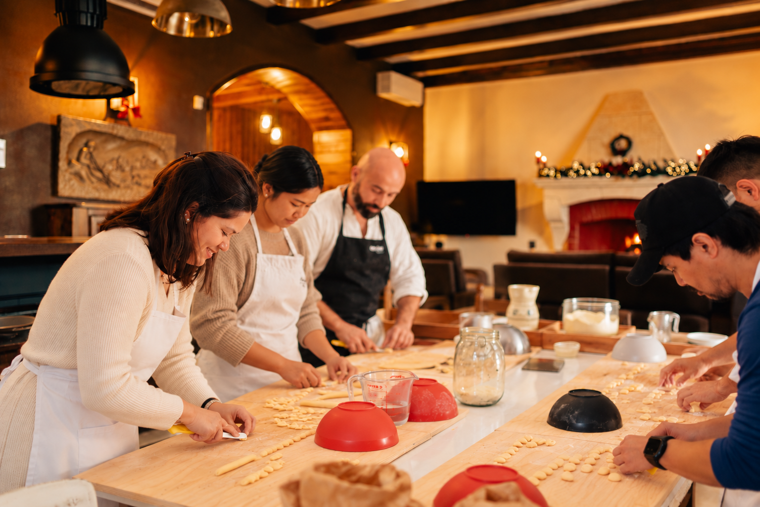 Making fresh pasta together in a Christmas kitchen