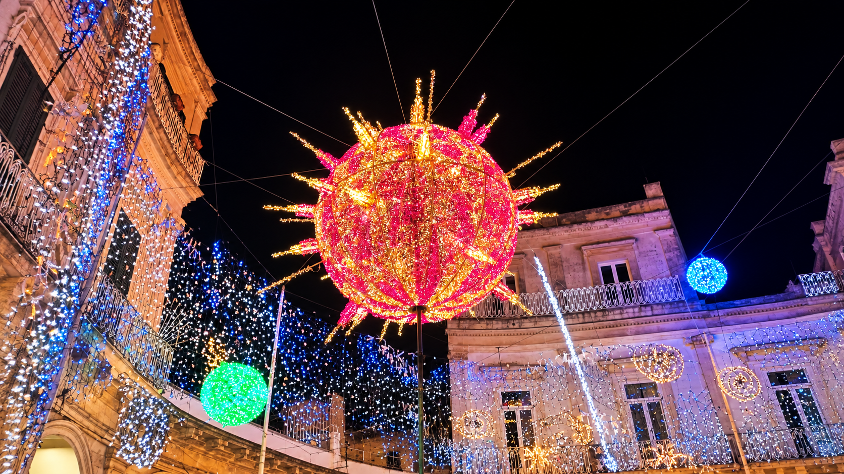 A village square lit for Christmas